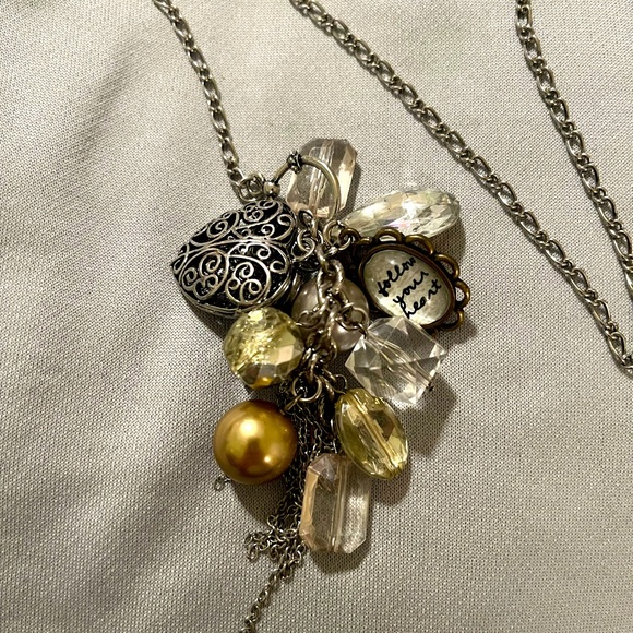 Pretty bookmark with many jewel and metallic charms. - Picture 1 of 6